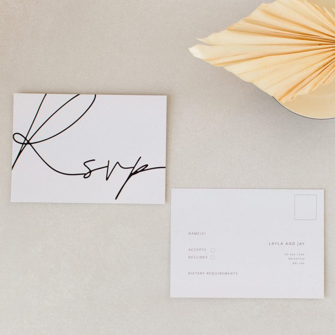 Libre Firma Wedding RSVP. Grey card, black script font
