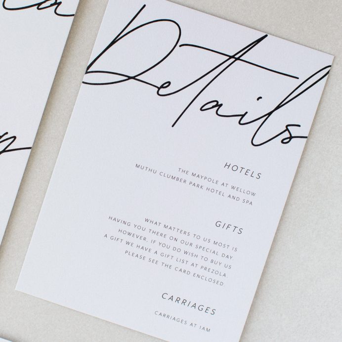 Libre Firma Wedding details card. Grey card, black script font