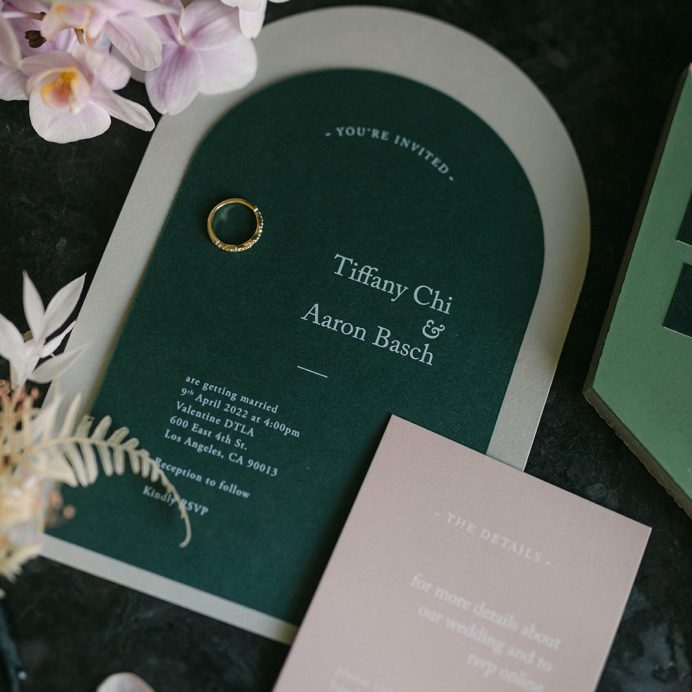 Green arch wedding invitation
