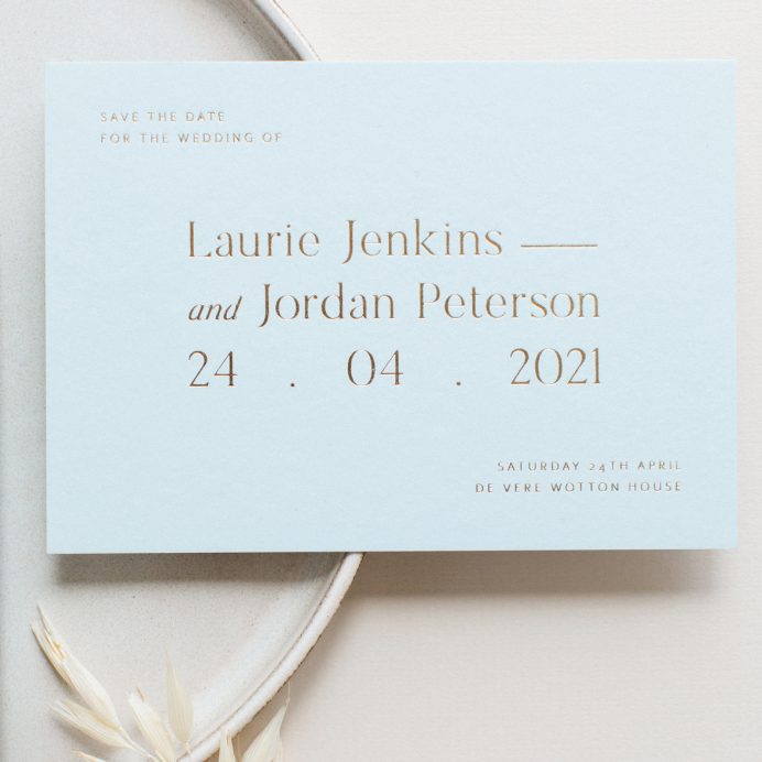 Refined gold wedding save the date in pastel blue with gold foil print