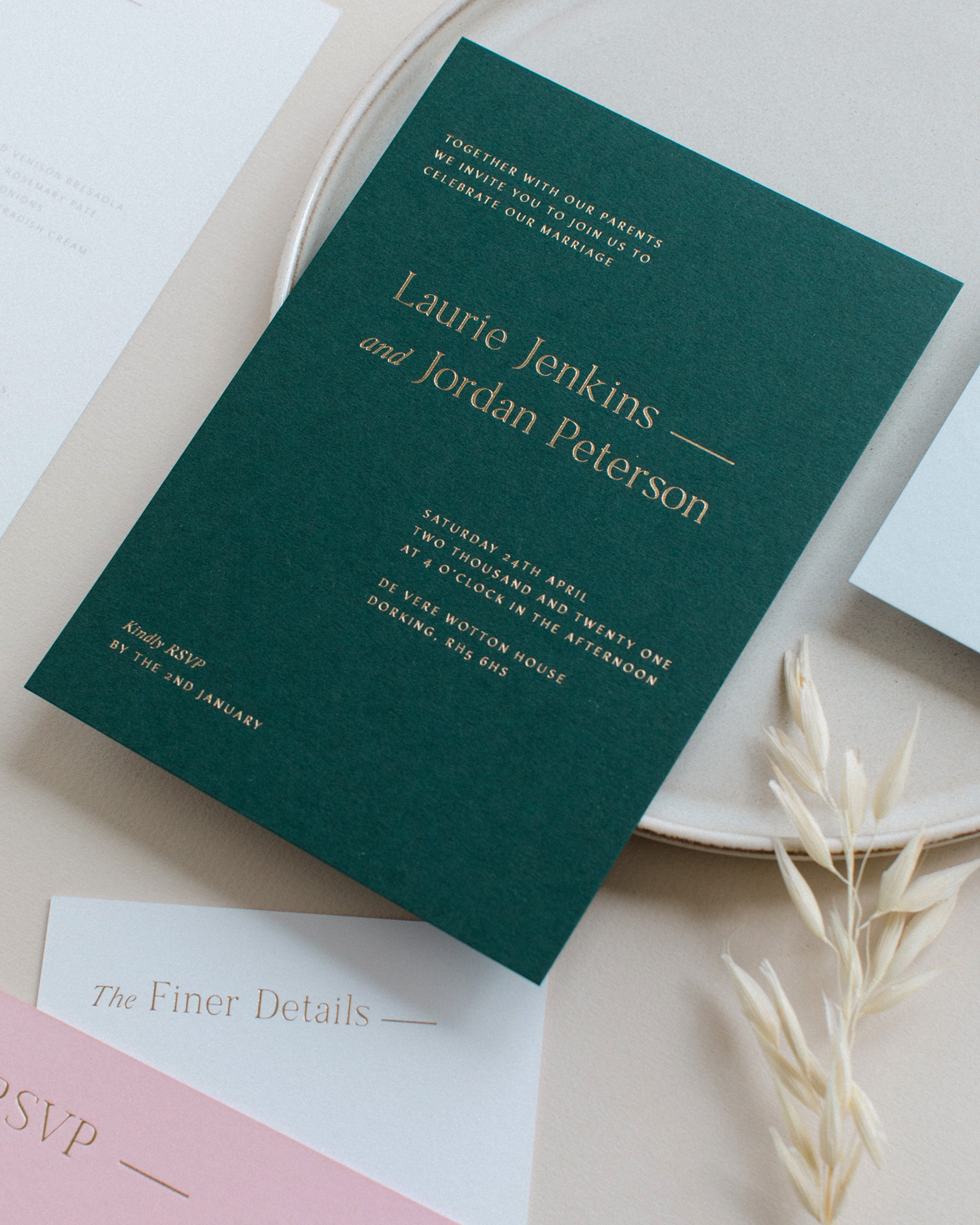 Refined gold wedding invitation in racing green with gold foil print