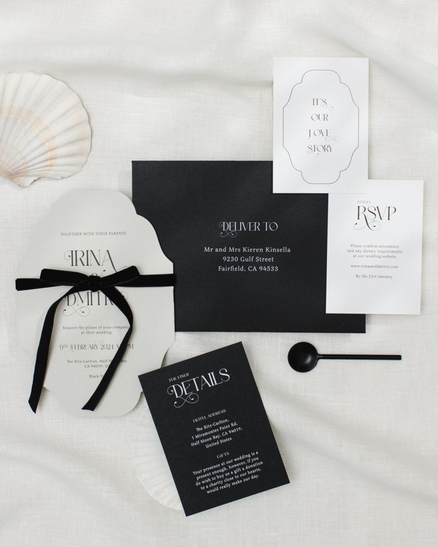 Grey die cut vintage shape wedding invitation. White RSVP card and black details card. Black bow tie