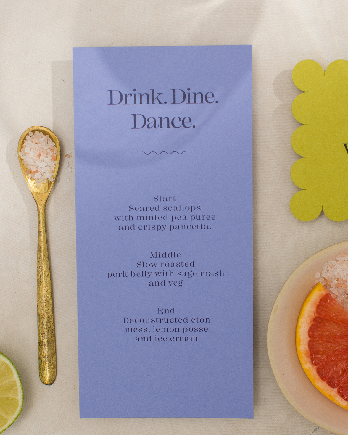 Purple wedding menu with drink, dine, dance typography.