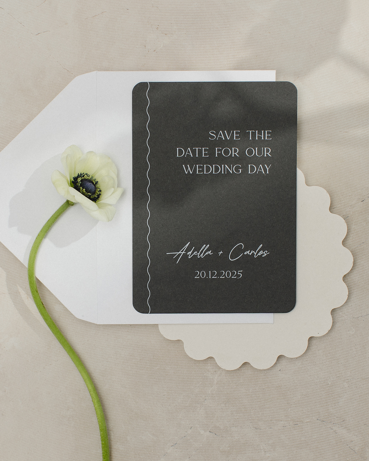 Dark grey rounded corners save the date with squiggly line