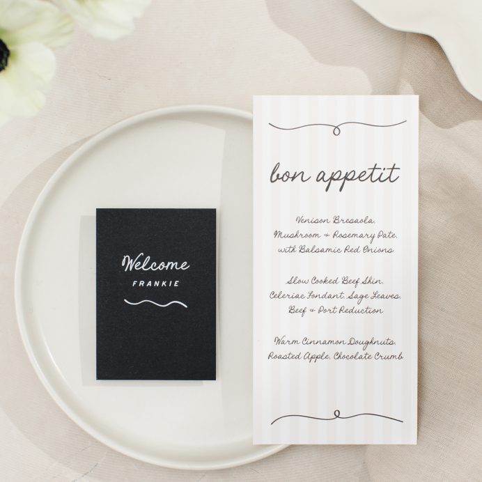 Tonal stripe wedding menu with hand drawn details and font. Black and white