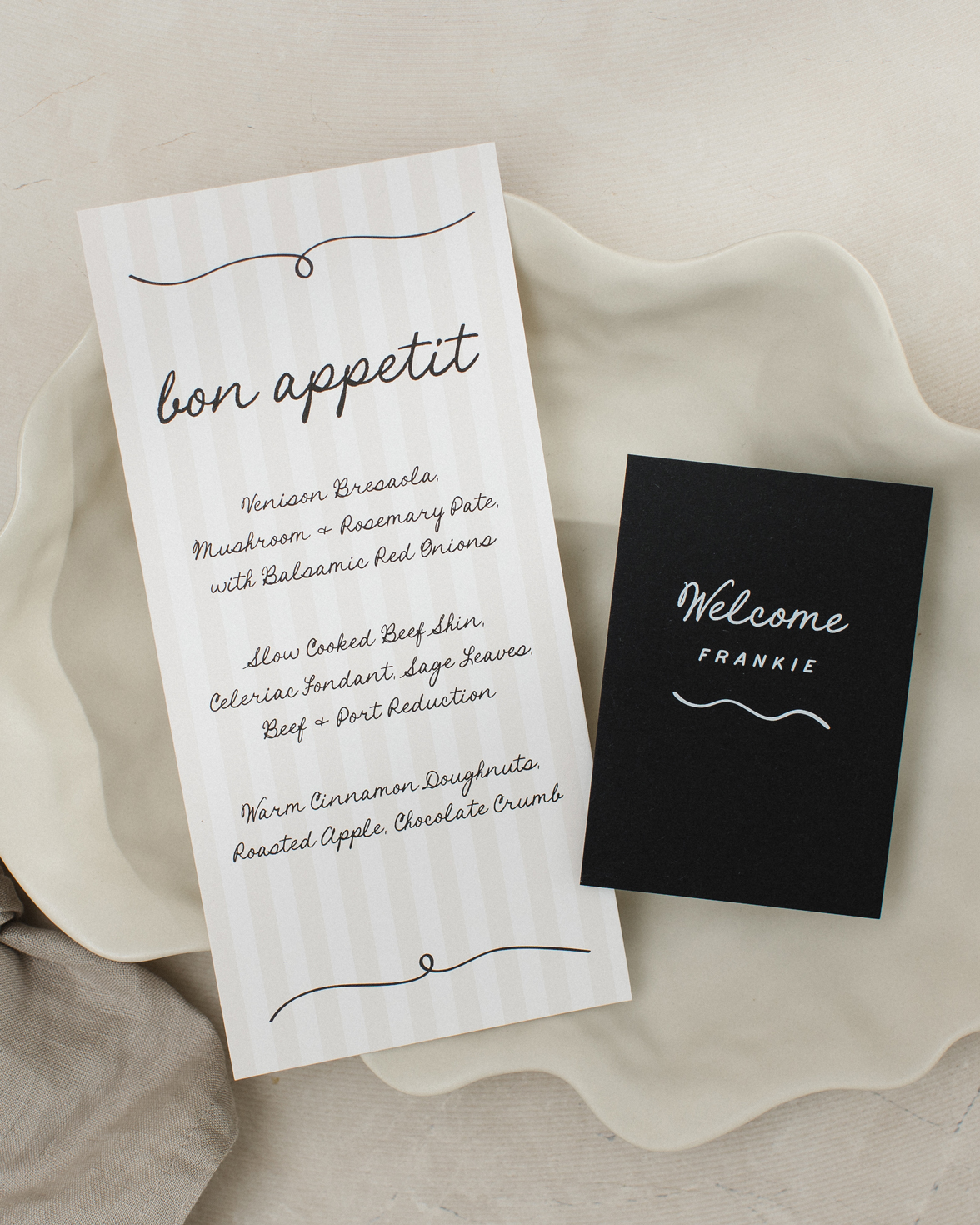 Tonal stripe wedding menu with hand drawn details and font. Black and white