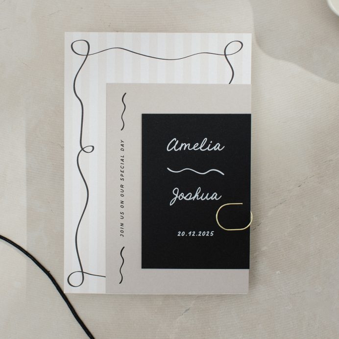 Wedding stationery bundle with gold clip. Tonal stripe wedding invitation with squiggly border and hand drawn font. Black RSVP card with white ink and QR code. Stone coloured details card with squiggly line